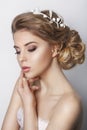 Beautiful bride with fashion wedding hairstyle - on white background Royalty Free Stock Photo