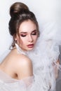 Beautiful bride with fashion wedding hairstyle on white background Royalty Free Stock Photo