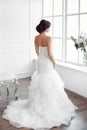 Beautiful bride in front of a window