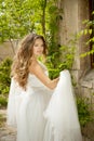 Beautiful bride girl walking at wedding day, happy woman in blow Royalty Free Stock Photo