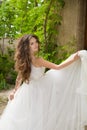 Beautiful bride girl walking at wedding day, happy woman in blow Royalty Free Stock Photo