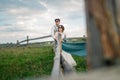 Newlyweds dressed in vintage style of mountains rocks on beautiful landscape
