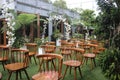 brown chairs lined up at the wedding event