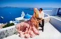 Beautiful bride and groom in their summer wedding day on greek island Santorini Royalty Free Stock Photo