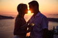 Beautiful bride and groom in their summer wedding day on greek island Santorini Royalty Free Stock Photo