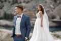 Wedding photography of a young couple, the bride and groom in a mountainous area in summer Royalty Free Stock Photo