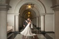 A beautiful bride and handsome groom at Christian church during wedding.