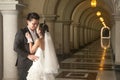 A beautiful bride and handsome groom at Christian church during wedding.