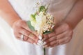Beautiful bride is holding a wedding colorful bouquet. Beauty of colored flowers. Royalty Free Stock Photo