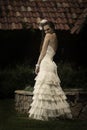 Beautiful bride looking flirtatiously over her shoulder