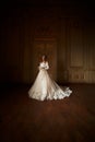 Beautiful bride in luxury baroque interior. Full-length portrait