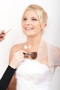 Beautiful bride and make-up artist Royalty Free Stock Photo