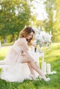 Beautiful bride outdoors in a wedding dress Royalty Free Stock Photo