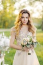 Beautiful bride outdoors in a wedding dress Royalty Free Stock Photo