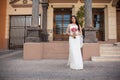 Beautiful bride outside a church Royalty Free Stock Photo