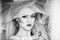 beautiful bride portrait with veil over her face, wearing professional make-up Royalty Free Stock Photo