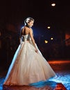 Beautiful bride posing on the evening street in her wedding day Royalty Free Stock Photo