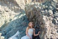 Beautiful bride posing in high mountain scenery Royalty Free Stock Photo