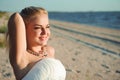 Beautiful bride posing at sea coast.