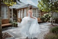 Beautiful bride running away in the garden Royalty Free Stock Photo