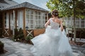 Beautiful bride running away in the garden Royalty Free Stock Photo