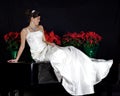 Beautiful Bride Sitting on a Piano