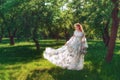 Beautiful bride in summer green park. Girl in vintage dress. Royalty Free Stock Photo