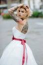 Beautiful bride with tattoo at wedding morning Royalty Free Stock Photo