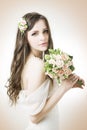 Beautiful bride with wedding bouquet