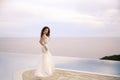 Beautiful Bride in wedding dress, outdoor portrait. Brunette ele Royalty Free Stock Photo