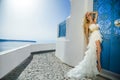 The beautiful bride in a wedding dress on Santorini in Greece.