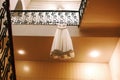 Beautiful bride wedding dress, white designer dress hanging on the stairs Royalty Free Stock Photo