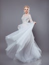 Beautiful bride in wedding flowing chiffon dress, Woman in long