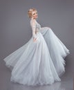 Beautiful bride in wedding flowing chiffon dress, Woman in long