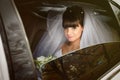 Beautiful bride in wedding limousine Royalty Free Stock Photo