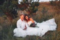 Beautiful wedding couple in a summer field Royalty Free Stock Photo