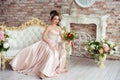 Beautiful bride in a white studio