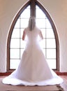 Beautiful bride at window