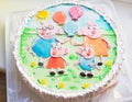 Beautiful and bright children`s cake with a cartoon hero - Pigpa Peppa