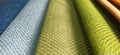 Beautiful bright collection of colorful fabric or textile samples. Fabric texture background