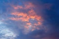 Beautiful bright colorful  pink red yellow clouds on dark sky at sunset or sunrise. Evening or morning sky natural eco background Royalty Free Stock Photo