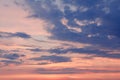 Beautiful bright colorful pink red yellow clouds on dark sky at sunset or sunrise. Evening or morning pastel color sky natural eco Royalty Free Stock Photo