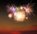 Beautiful bright fireworks lighting up twilight sky outdoors Royalty Free Stock Photo