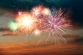 Beautiful bright fireworks lighting up twilight sky outdoors Royalty Free Stock Photo