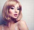 Beautiful bright makeup blond woman with short hair style looking sexy. Closeup portrait Royalty Free Stock Photo