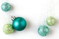 Beautiful, bright, modern Christmas holiday ornaments decorations on white background with luxe glitter effect