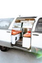 Beautiful bright natural light entering and illuminating an old self converted minivan campervan for van life. The vanlife