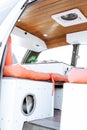 Beautiful bright natural light entering and illuminating an old self converted minivan campervan for van life. The vanlife