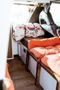 Beautiful bright natural light entering and illuminating an old self converted minivan campervan for van life. The vanlife