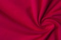 Beautiful bright red knit fabric for sewing Royalty Free Stock Photo